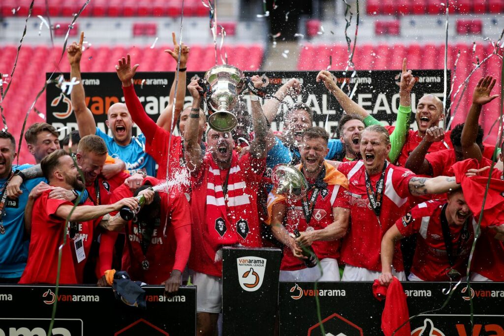 Salford Lifting the National League play-off trophy at Wembley