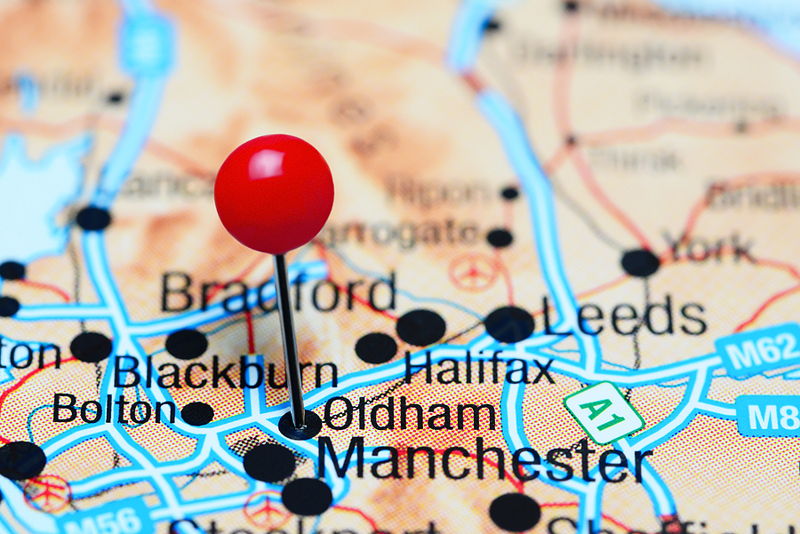 oldham on map with red pin in it